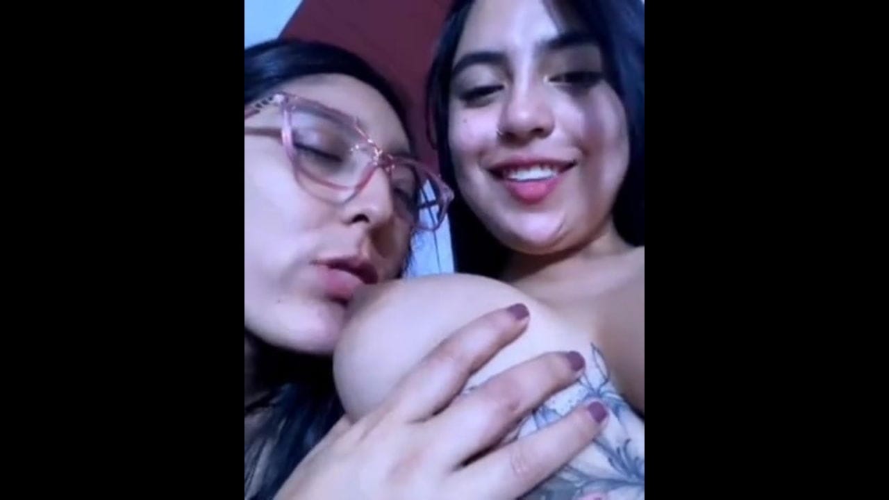 Horny Girl Sucking Lesbian Friends Boob