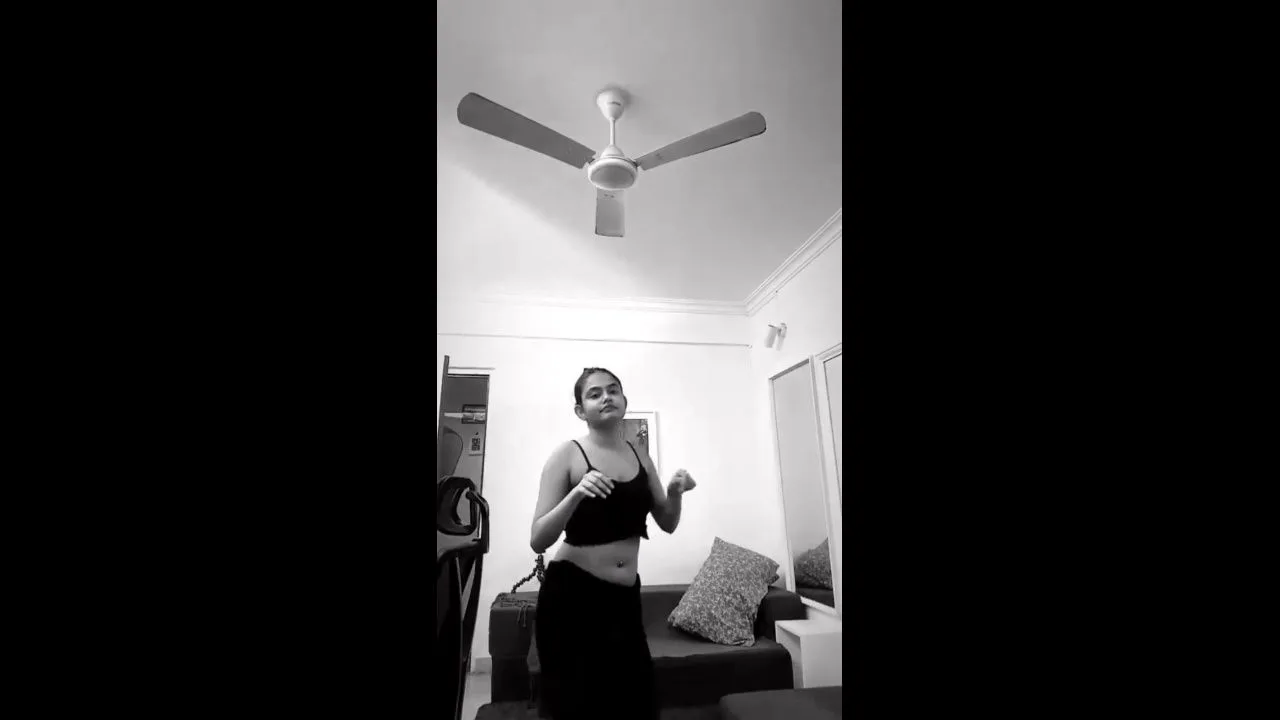 malayali actress sexy pierced navel and boobs in black costume 2